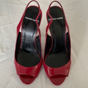 Classic patent leather sling back peepedtoe pumps in Deep red colour.